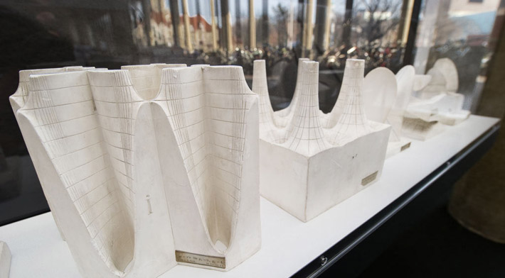 A series of abstract models carved from a solid white material