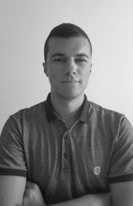 black and white headshot of Aleksandar Bauranov