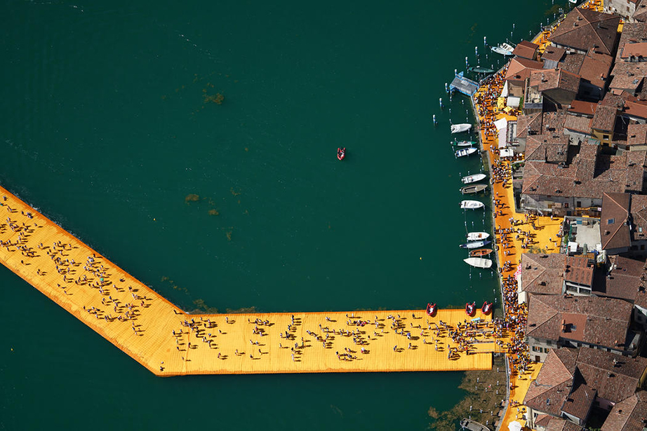 "The Floating Piers" on Lake Iseo, Italy, was conceived in 1970 yet came to fruition only in the summer of 2016. Photo by Wolfgang Volz.