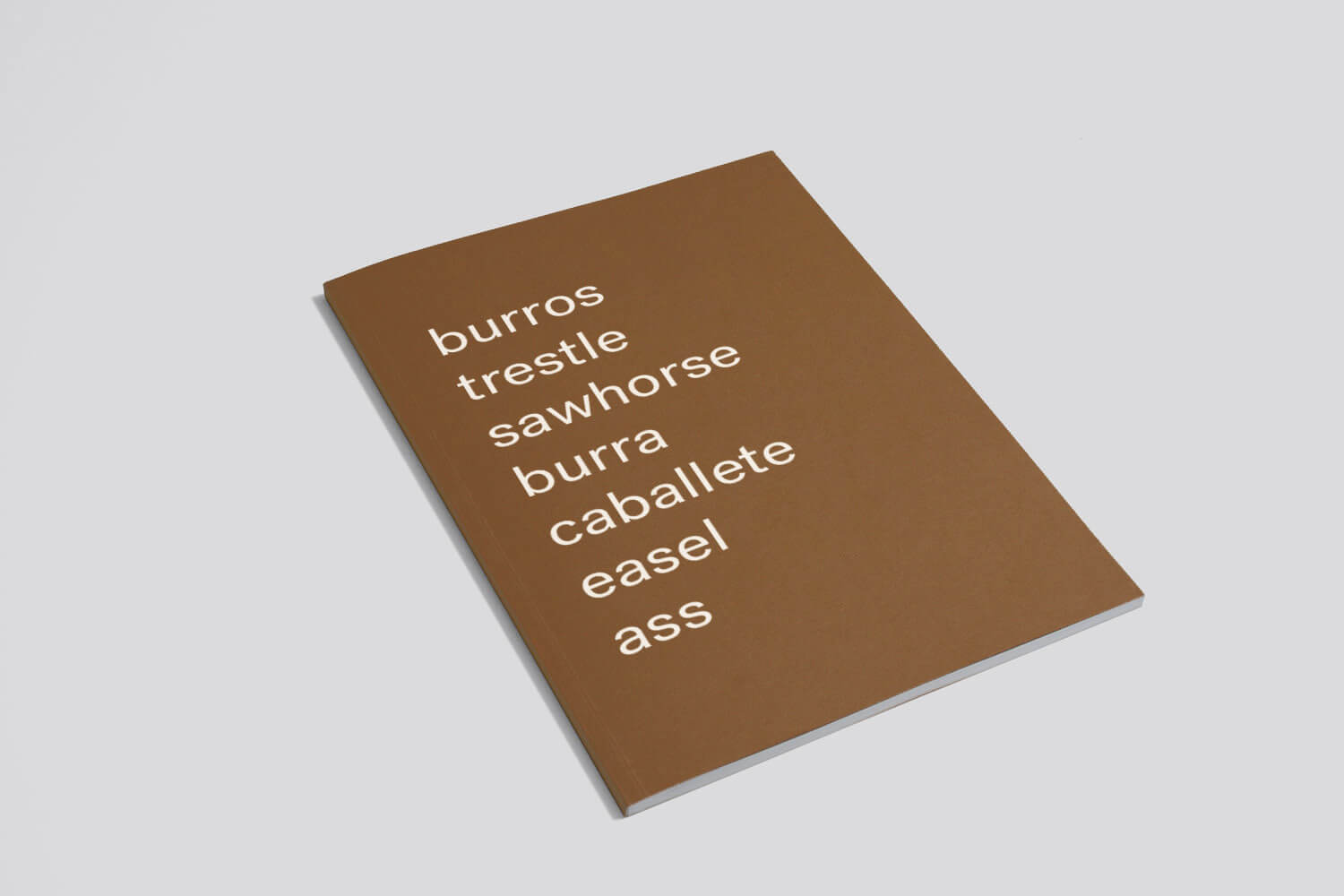 booklet with text "burros, trestle, sawhorse, burra, caballete, easel, ass"