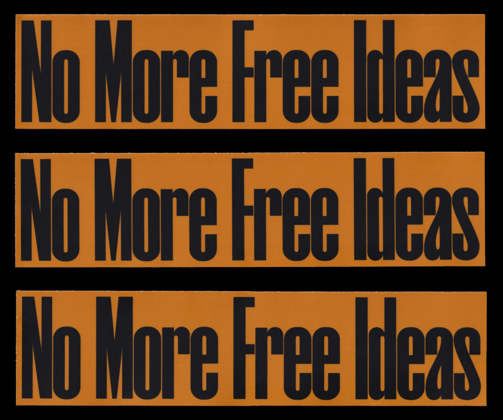 "No More Free Ideas" written in black text on an orange background, repeated three times. 