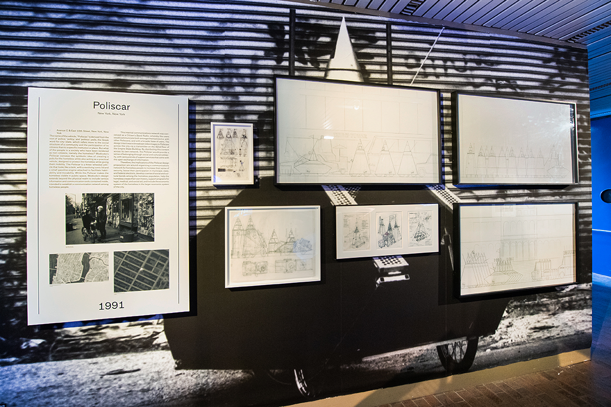 A view of the exhibit in the GSD’s Druker Design Gallery, showing a wall with various drawings of Wodiczko’s “Poliscar.”