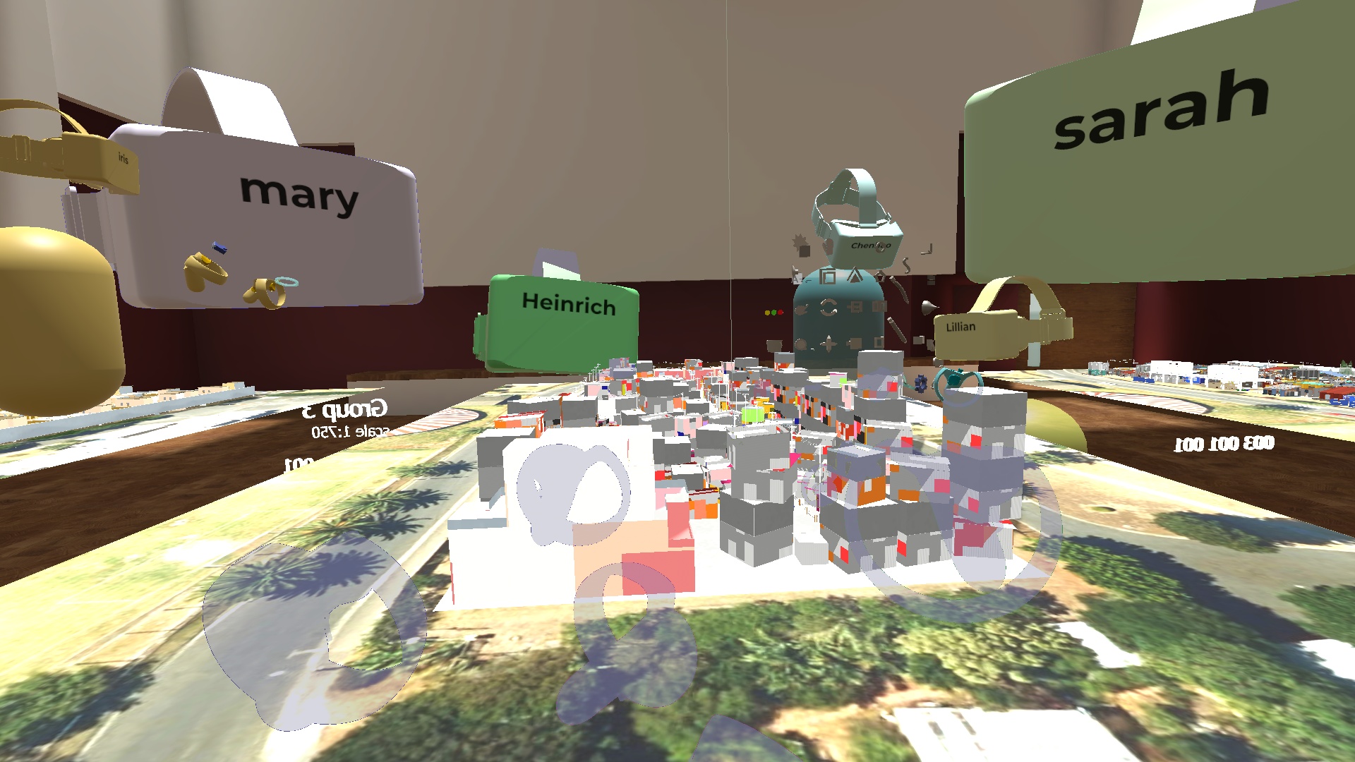 Colorful avatars float around a site model using virtual reality.