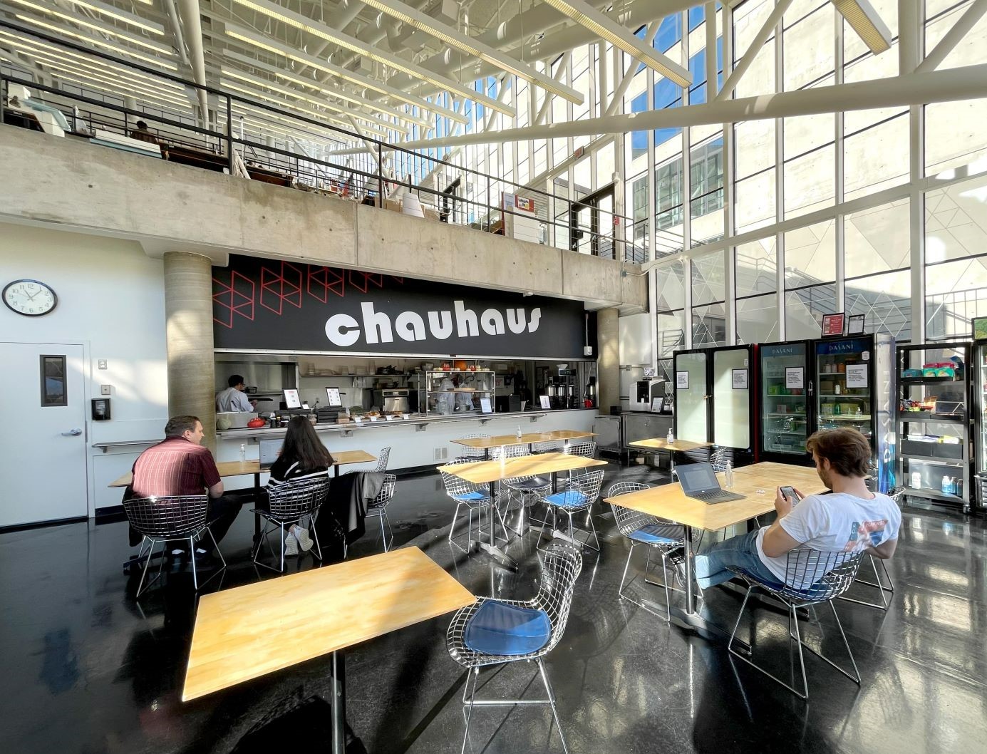 Students sitting and working in the ChauHaus cafe.
